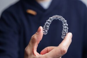 what does invisalign do aligners